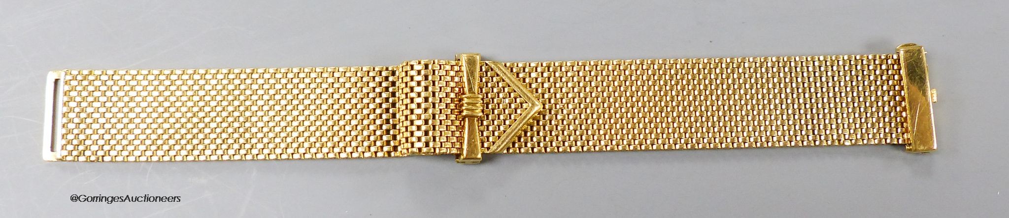 An 18ct gold woven brick link bracelet. overall 17.8cm, 74.5 grams.
